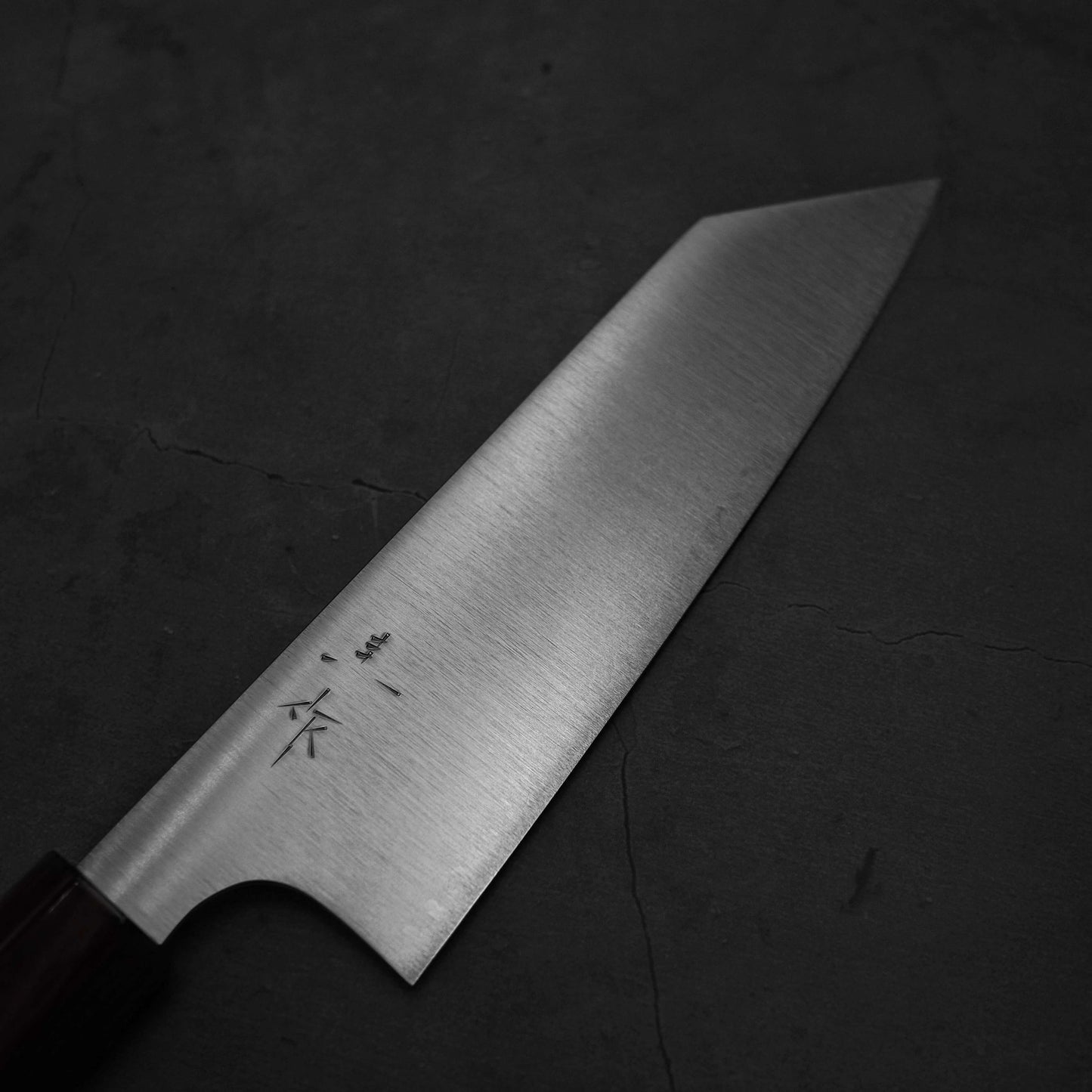 Top view of Kei Kobayashi SG2 bunka where it focuses on the right side of the blade only