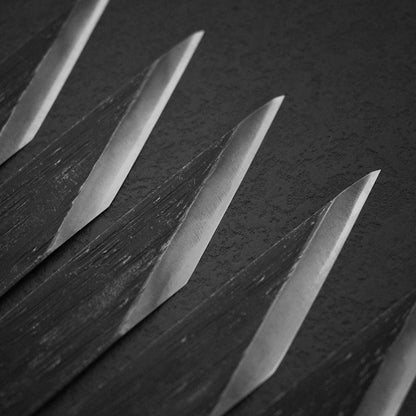 Top view of multiple Kiridashi AS 24mm. Image focuses on the tip areas