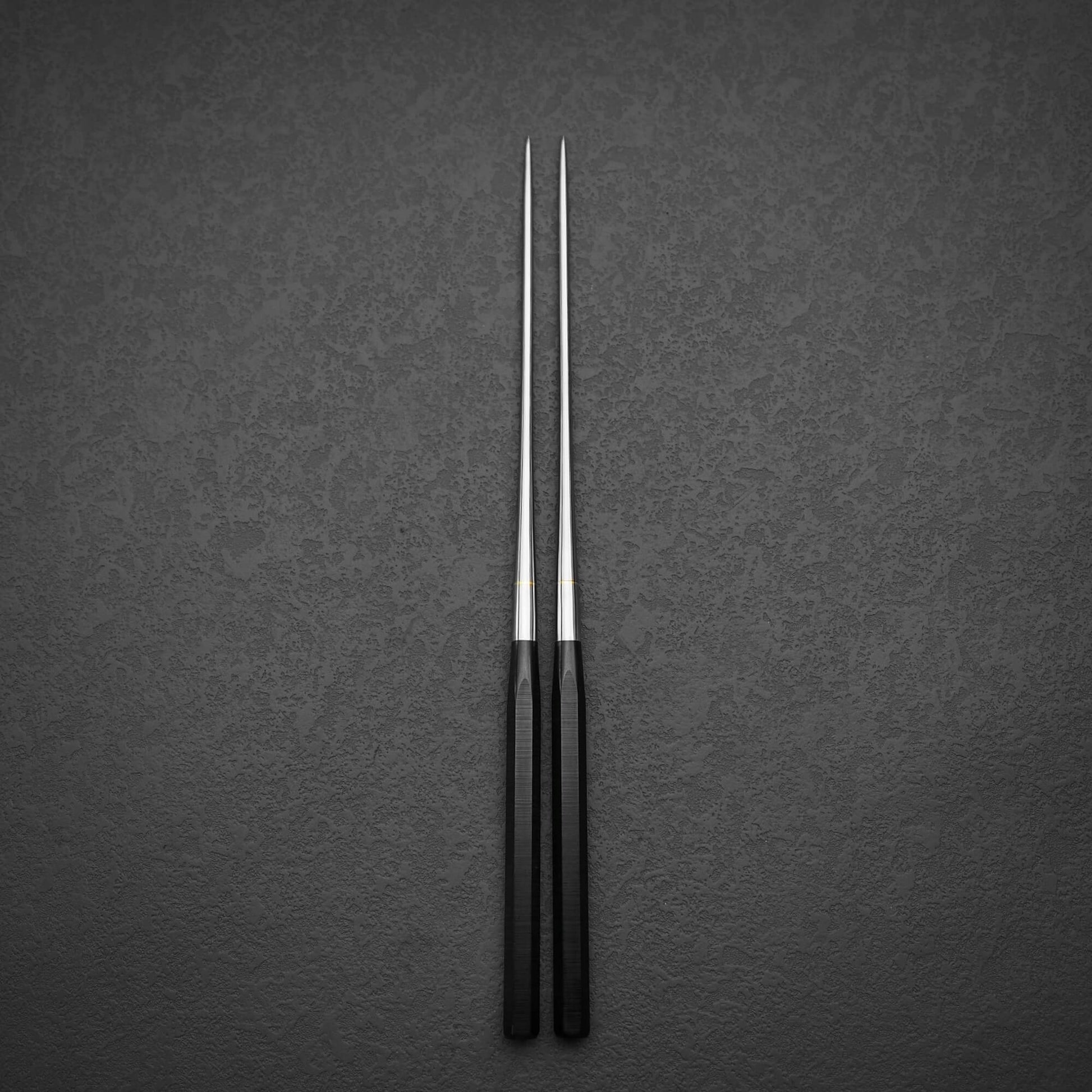 Top view of 180mm moribashi plating chop sticks with hexagonal handle in vertical position