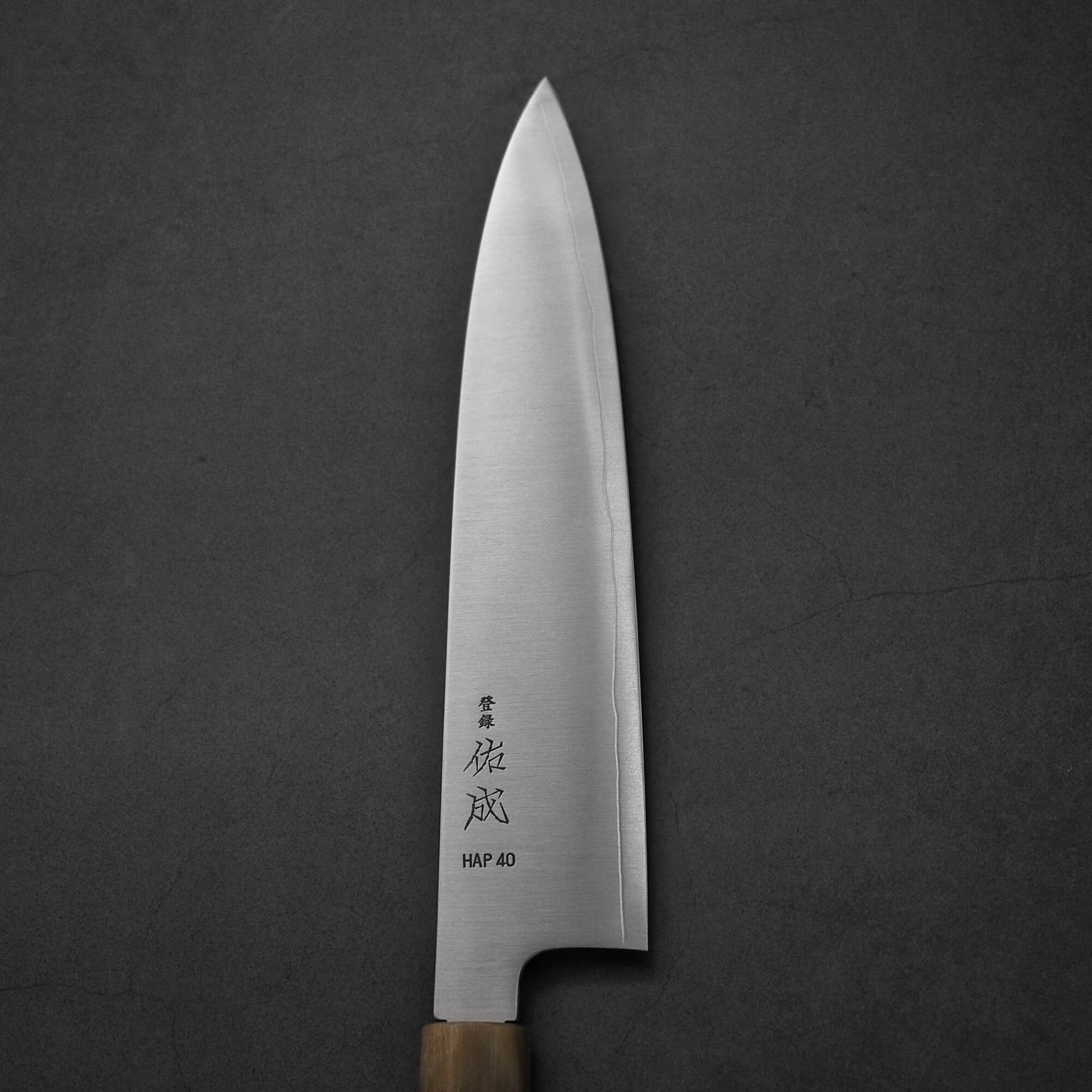 Top view of Sukenari HAP40 240mm gyuto. Image focuses on the right side of the blade