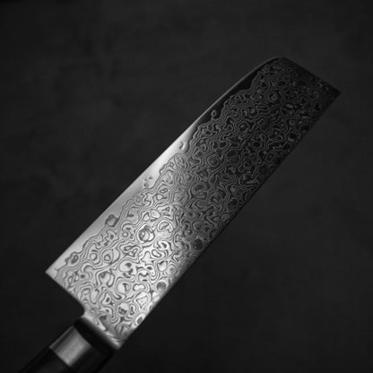 Top view of Tsunehisa ZA18 damascus nakiri knife. Image shows the left side of the blade.